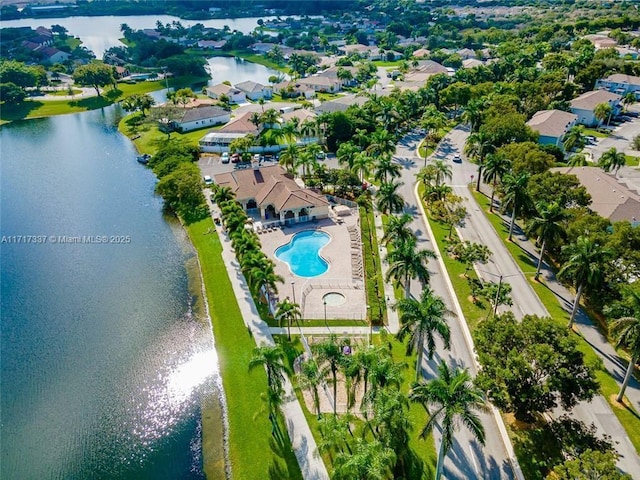 aerial view featuring a water view and a residential view