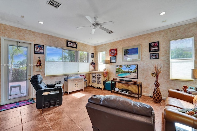 tiled living room featuring ceiling fan and crown molding