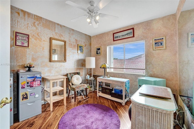 game room with ceiling fan and hardwood / wood-style floors