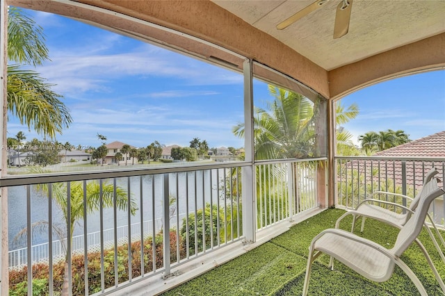 balcony featuring a water view