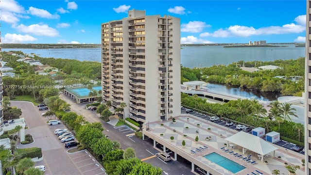 birds eye view of property featuring a water view