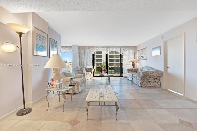 living room featuring a textured ceiling