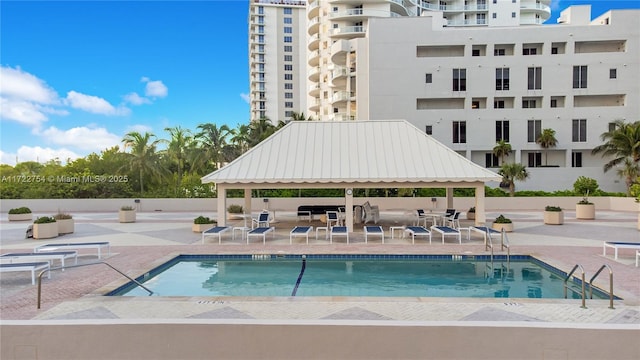 view of pool with a gazebo and a patio