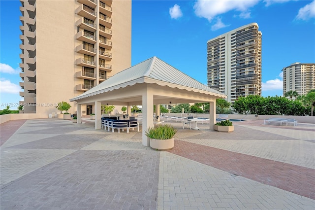 view of home's community featuring a gazebo and a patio