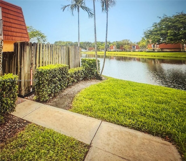 view of yard with a water view