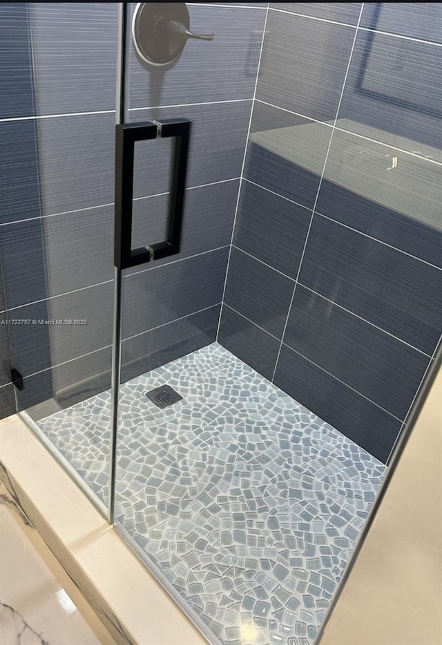 bathroom featuring walk in shower