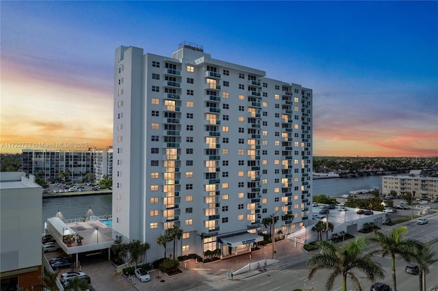 outdoor building at dusk with a water view