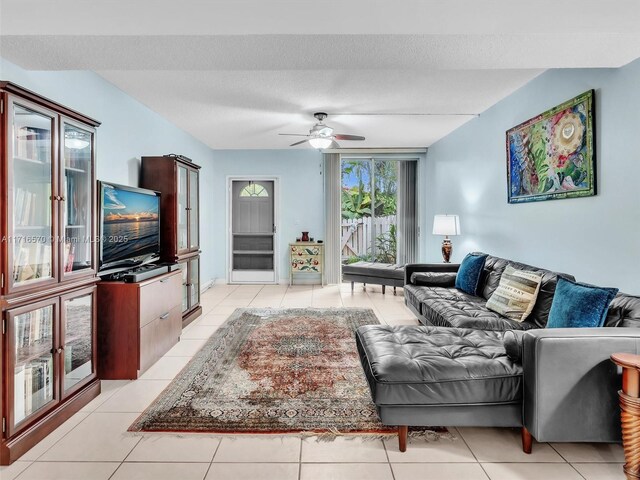 dining room with a textured ceiling and light tile patterned floors