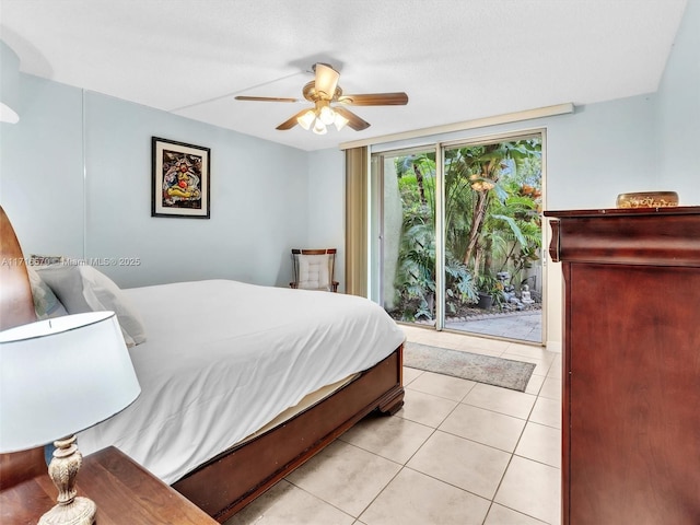 bedroom with access to outside, light tile patterned floors, and ceiling fan