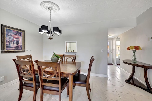 dining space with light tile patterned floors, a textured ceiling, and a notable chandelier