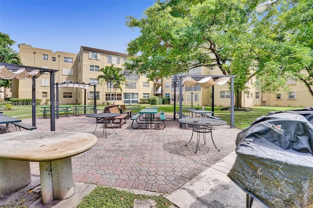 view of property's community with a pergola