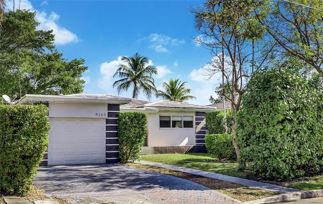 view of front of house with a garage