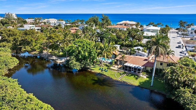 drone / aerial view with a water view