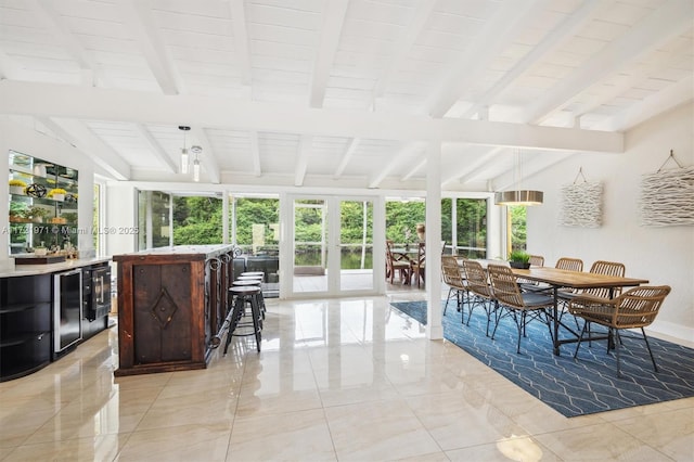 sunroom with vaulted ceiling with beams, wood ceiling, beverage cooler, and french doors