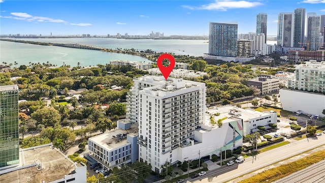 birds eye view of property featuring a water view