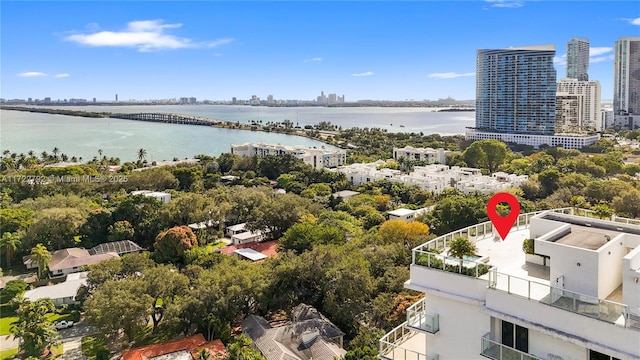 birds eye view of property featuring a water view