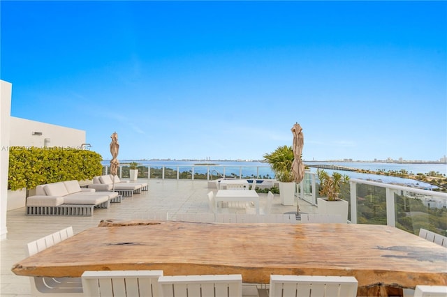 exterior space featuring a water view and an outdoor hangout area