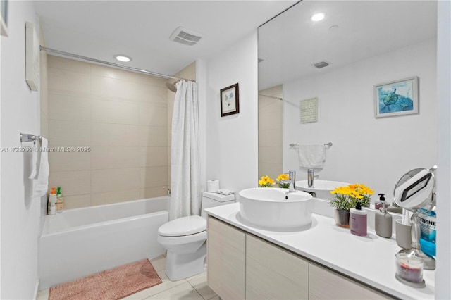 full bathroom with toilet, vanity, tile patterned floors, and shower / tub combo with curtain