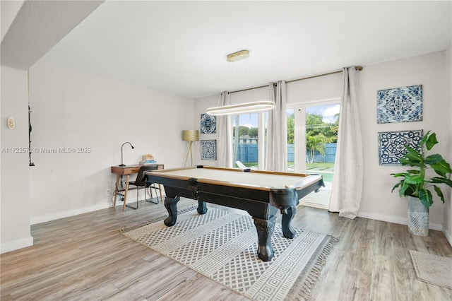 playroom featuring billiards and light hardwood / wood-style flooring