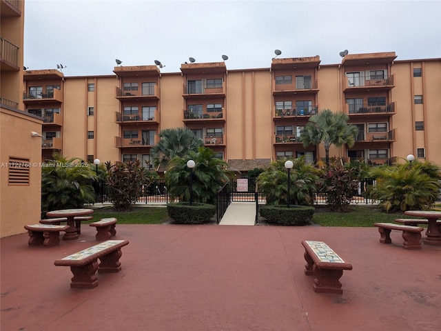 surrounding community with a patio area