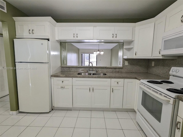 kitchen featuring light tile patterned flooring, sink, backsplash, white cabinets, and white appliances