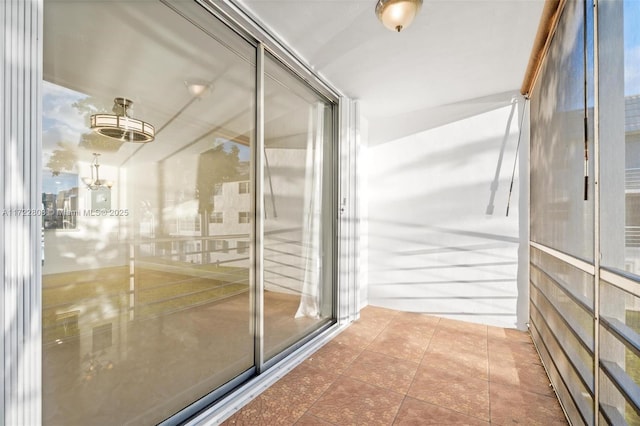 bathroom with tile patterned floors and expansive windows