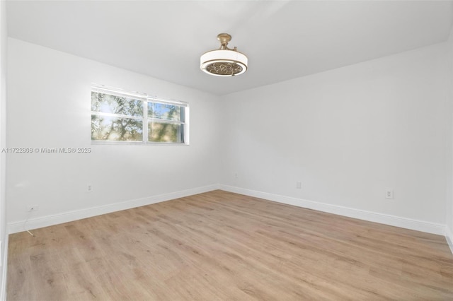 unfurnished room featuring light hardwood / wood-style floors