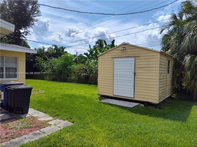 view of yard with a storage shed