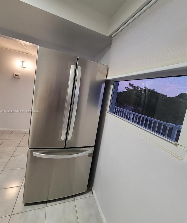 room details featuring stainless steel fridge