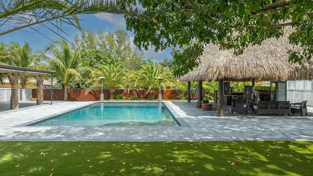 view of swimming pool with a gazebo, a patio area, and a yard