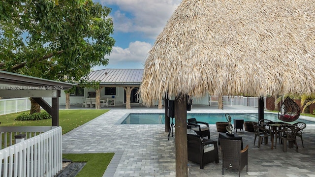 view of pool featuring a patio area