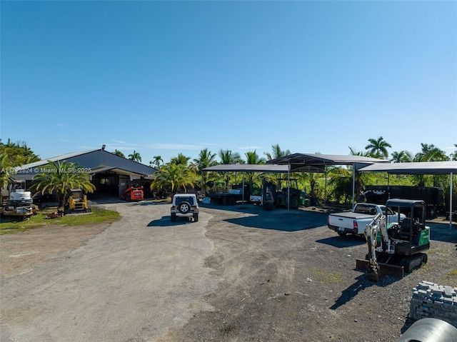 exterior space with a carport