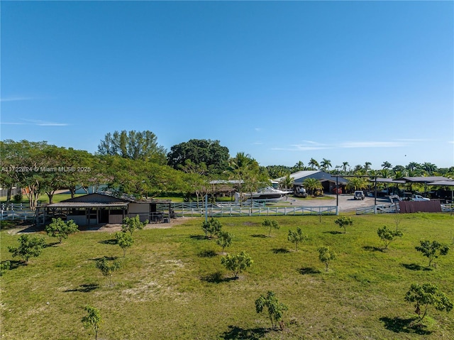 view of yard with a rural view