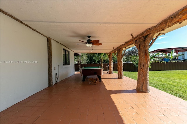 view of patio featuring ceiling fan