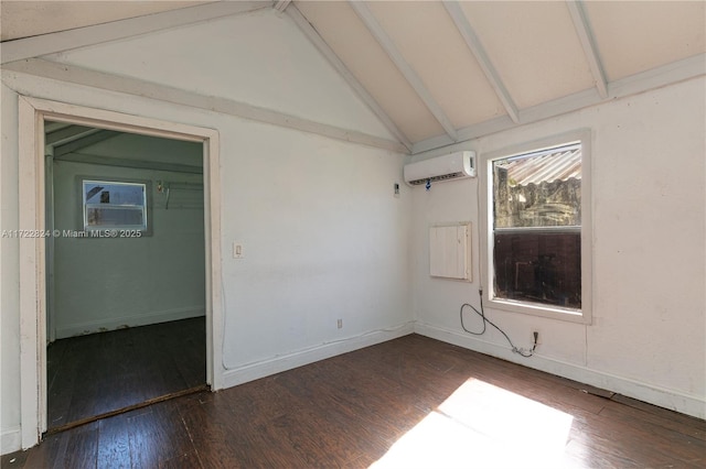 unfurnished room with lofted ceiling with beams, dark wood-type flooring, and a wall unit AC