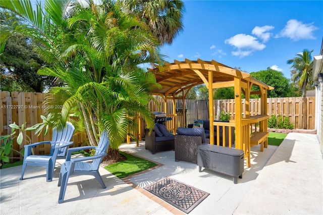 view of patio with a fenced backyard and a pergola