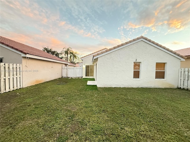 exterior space with a yard