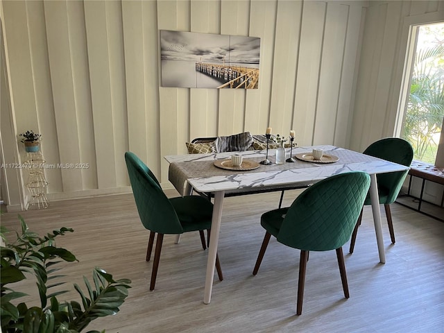 dining room featuring light hardwood / wood-style floors