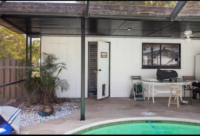 exterior space featuring a patio area and ceiling fan