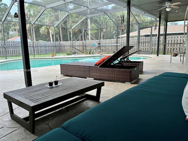 view of pool with a lanai and a patio area