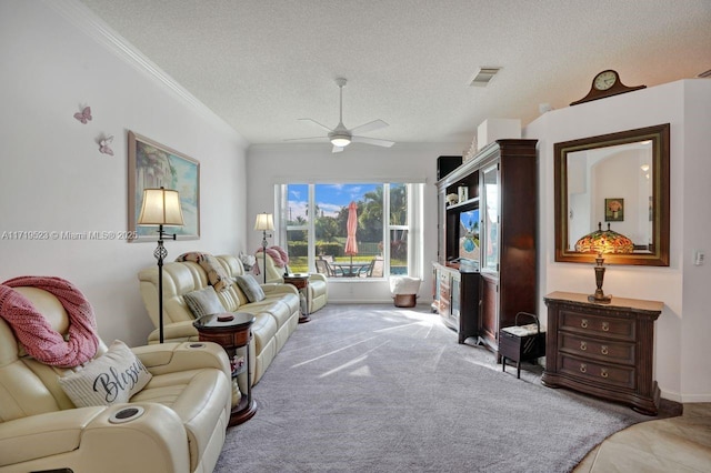 carpeted living room with a textured ceiling, ceiling fan, and crown molding