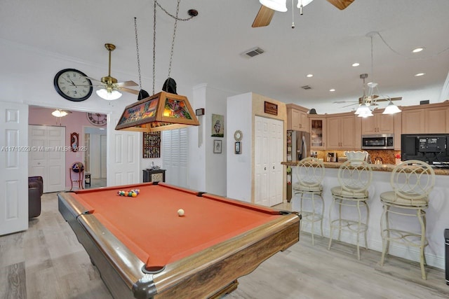 recreation room featuring ceiling fan, light wood-type flooring, crown molding, and pool table