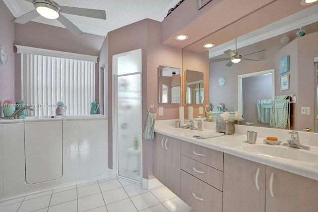 bathroom featuring vanity, tile patterned floors, crown molding, a textured ceiling, and an enclosed shower