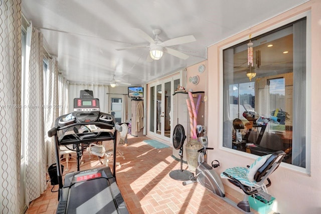 workout area featuring ceiling fan