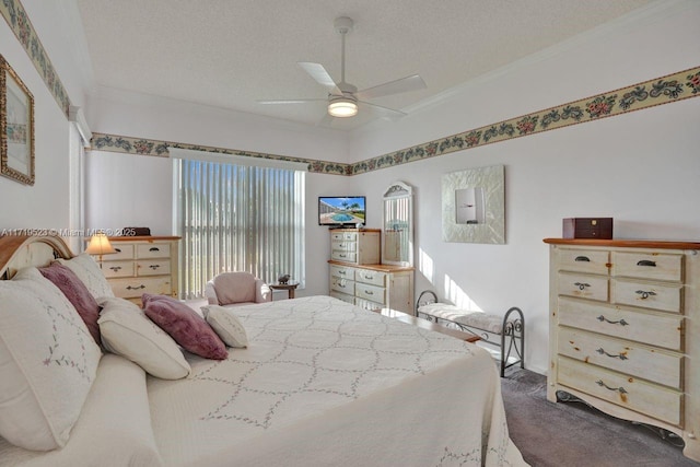 carpeted bedroom featuring a textured ceiling, ceiling fan, and crown molding