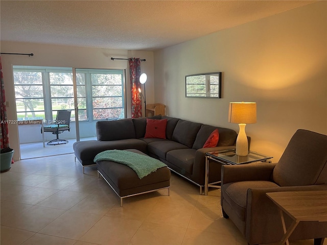 tiled living room with a textured ceiling