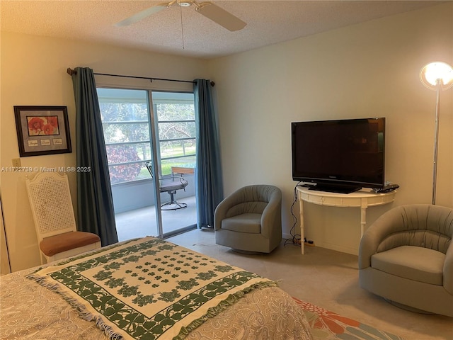 bedroom with ceiling fan, a textured ceiling, and access to outside