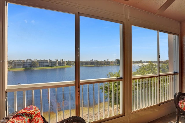 sunroom with a water view