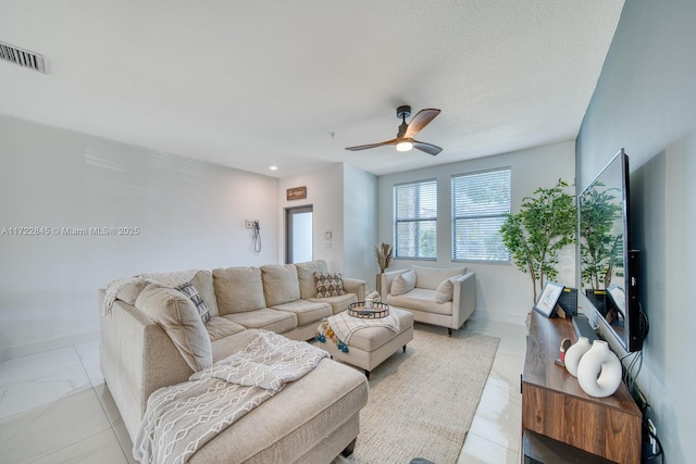 living room with ceiling fan