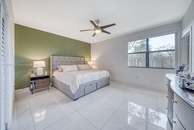 bedroom featuring ceiling fan